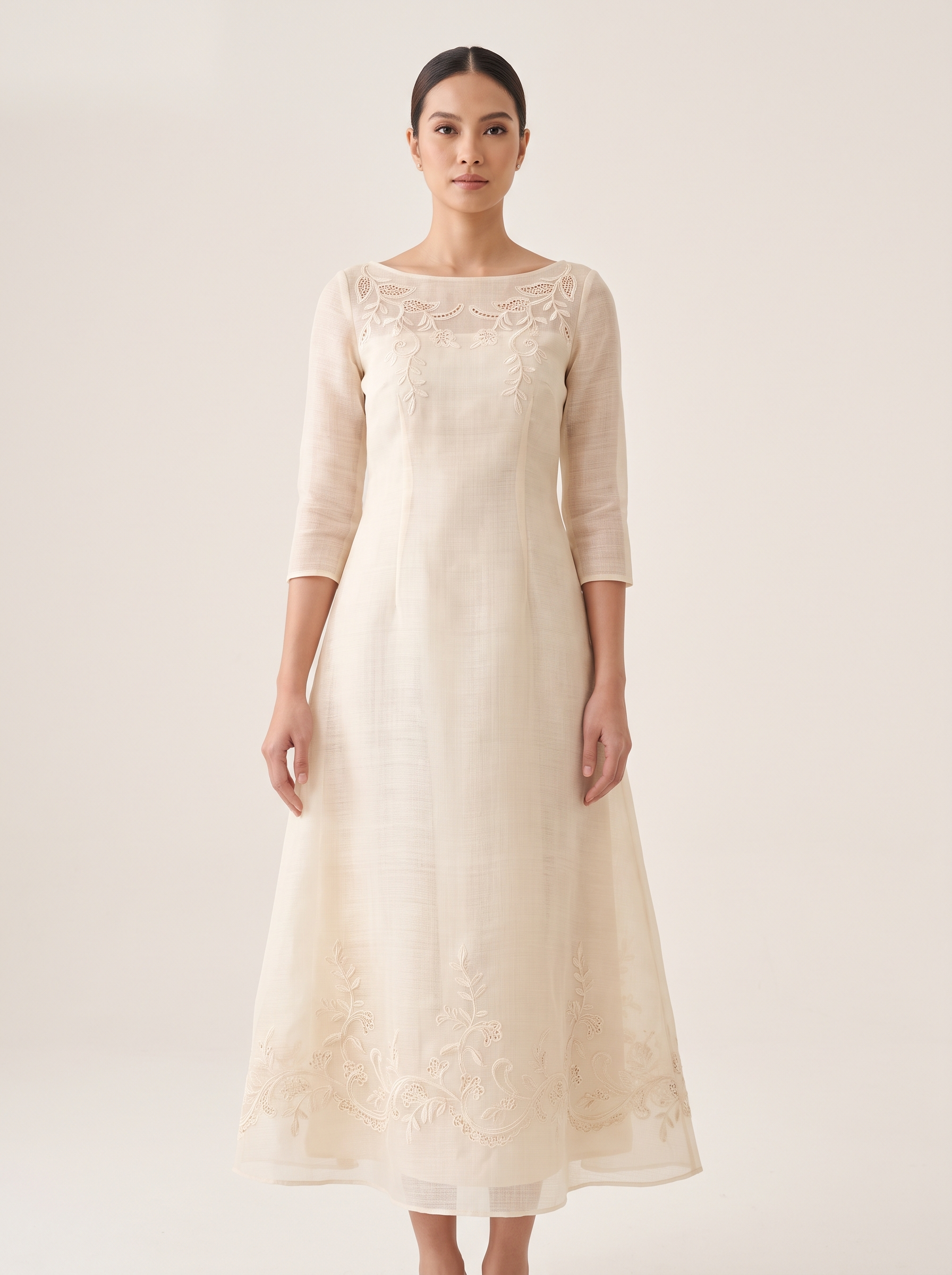 Photo reference of a modern ecru Filipiniana A-line dress with calado embroidery, no butterfly sleeves